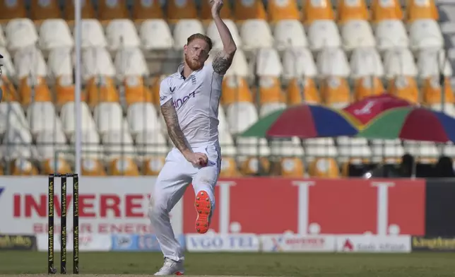 FILE - England's Ben Stokes bowls during the third day of the second test cricket match between Pakistan and England, in Multan, Pakistan, Thursday, Oct. 17, 2024. (AP Photo/K.M. Chaudary, File)