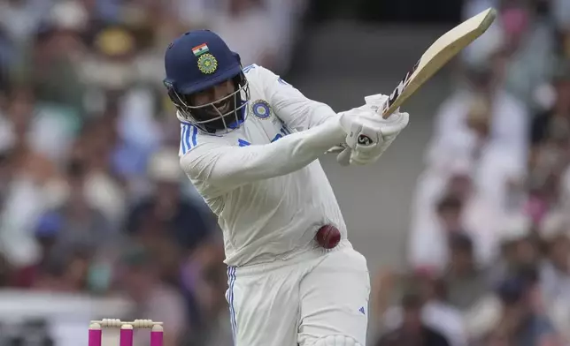 FILE - India's Jasprit Bumrah is hit while batting during play on the first day of the fifth cricket test between India and Australia at the Sydney Cricket Ground, in Sydney, Australia, Friday, Jan. 3, 2025. (AP Photo/Mark Baker, File)