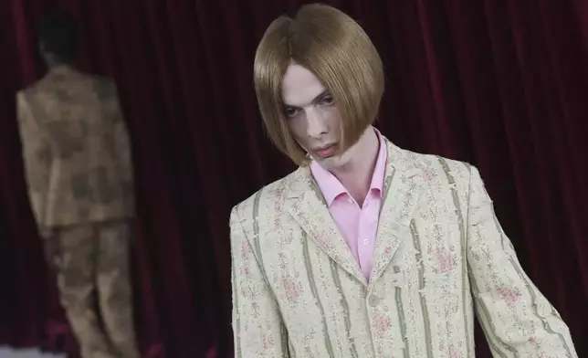 A model wears a creation part of the men's Junya Watanabe Spring-Summer 2026 collection, that was presented in Paris Friday, June 27, 2025. (AP Photo/Christophe Ena)