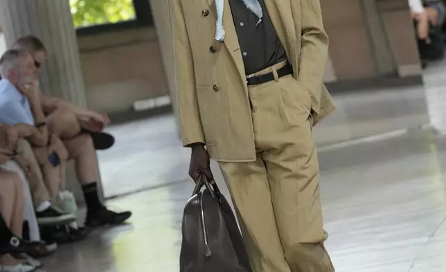 A model wears a creation as part of the men's Hermes Spring-Summer 2026 collection, that was presented in Paris Saturday, June 28, 2025. (AP Photo/Michel Euler)