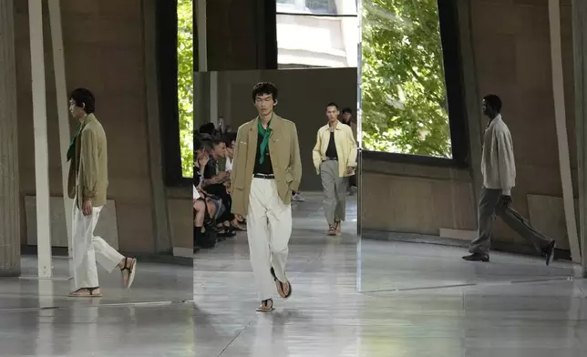 A model wears a creation as part of the men's Hermes Spring-Summer 2026 collection, that was presented in Paris Saturday, June 28, 2025. (AP Photo/Michel Euler)
