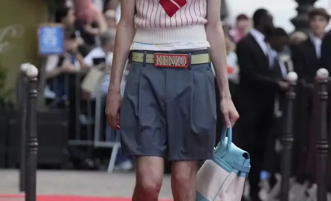 A model wears a creation as part of the men's Kenzo Spring-Summer 2026 collection, that was presented in Paris, Friday, June 27, 2025. (AP Photo/Michel Euler)