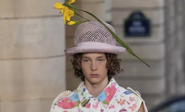 A model wears a creation part of the men's Walter van Beirendonck Spring-Summer 2026 collection, that was presented in Paris Wednesday, June 25, 2025. (AP Photo/Michel Euler)