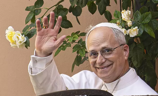 FILE - Pope Leo XIV leaves the Augustinian General House in Rome after a visit, Tuesday, May 13, 2025. (AP Photo/Domenico Stinellis, File)