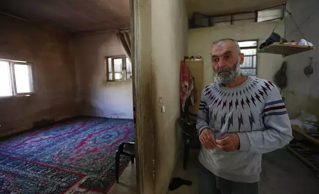 Ahmad Hammadi, who his son Mohammed who was killed in an Israeli pre-dawn raid on Beit Jin village, southern Syria, speaks during an interview with The Associated Press, Thursday, June 12, 2025. (AP Photo/Omar Sanadiki)