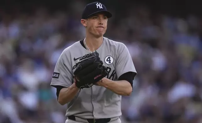 New York Yankees' Ryan Yarbrough celebrates after striking out Los Angeles Dodgers' Freddie Freeman to end the sixth inning of a baseball game Sunday, June 1, 2025, in Los Angeles. (AP Photo/Mark J. Terrill)