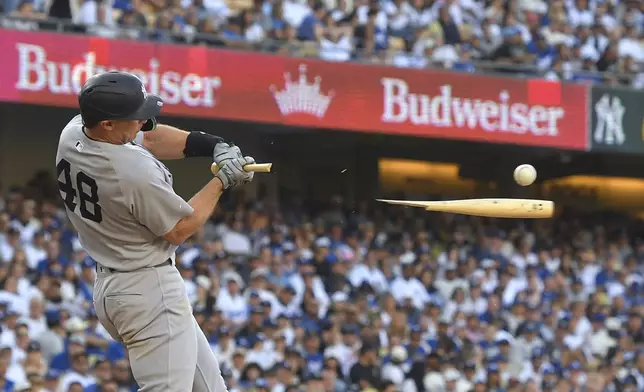 New York Yankees' Paul Goldschmidt breaks his bat as he grounds out during the seventh inning of a baseball game against the Los Angeles Dodgers, Sunday, June 1, 2025, in Los Angeles. (AP Photo/Mark J. Terrill)
