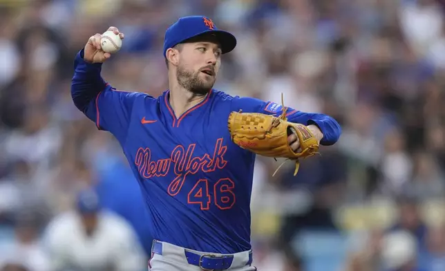 New York Mets starting pitcher Griffin Canning throws to the plate during the first inning of a baseball game against the Los Angeles Dodgers, Wednesday, June 4, 2025, in Los Angeles. (AP Photo/Mark J. Terrill)
