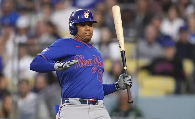 New York Mets' Juan Soto takes a close pitch during the third inning of a baseball game against the Los Angeles Dodgers, Wednesday, June 4, 2025, in Los Angeles. (AP Photo/Mark J. Terrill)