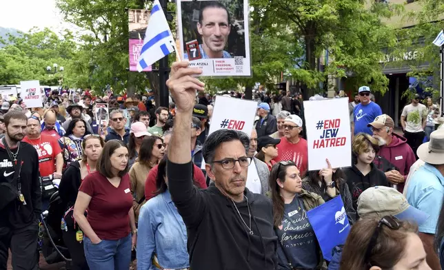Jeff Burak marches in Boulder, Colo., on Sunday, June 8, 2025, to call for the release of Israeli hostages. (AP Photo/Thomas Peipert)