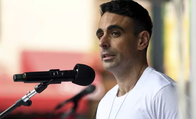 Moshe Lavi, whose brother-in-law, Omri Miran, is being held hostage in Gaza, speaks at a rally in Boulder, Colo., on Sunday, June 8, 2025. (AP Photo/Thomas Peipert)