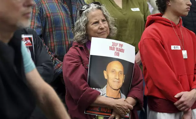 Shari Edelstein shows her support for the hostages held in Gaza during the Boulder Jewish Festival in Boulder, Colo., on Sunday, June 8, 2025. (AP Photo/Thomas Peipert)