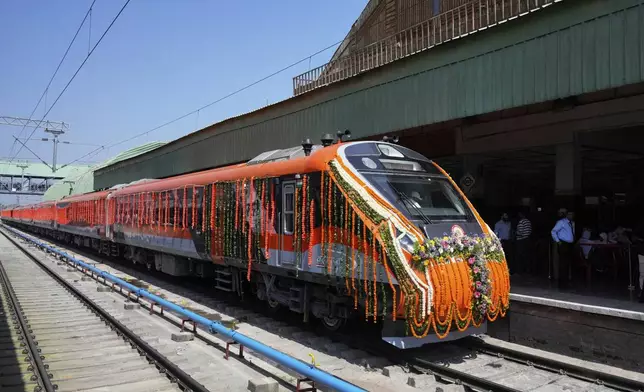 Vande Bharat Express train soon to be inaugurated to run between Srinagar and Katra, stands at a platform in Srinagar, Indian controlled Kashmir, Friday, June 6, 2025. (AP Photo/Dar Yasin)