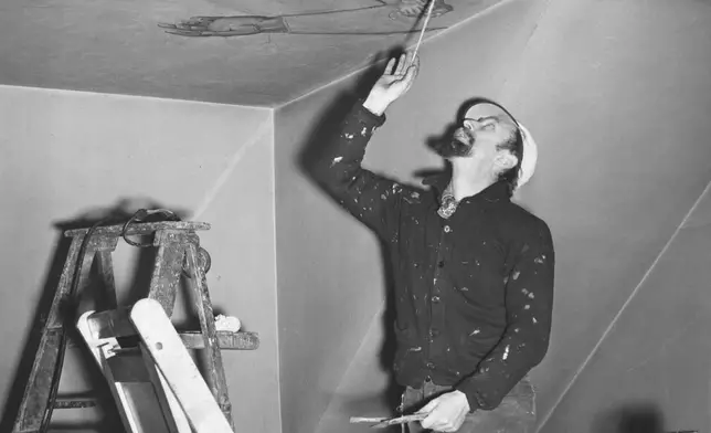 Artist Maxo Vanka works on a mural inside St. Nicholas Croatian Catholic Church in Millvale, Pa., on Nov. 7, 1941. (AP Photo/William C. Allen, File)
