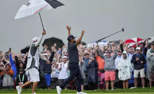 J.J. Spaun celebrates after sinking a birdie putt to win the U.S. Open golf tournament at Oakmont Country Club Sunday, June 15, 2025, in Oakmont, Pa. (AP Photo/Carolyn Kaster)