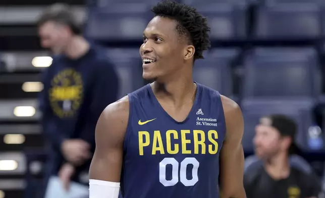 Indiana Pacers guard Bennedict Mathurin walks on the court during a practice, Wednesday, June 4, 2025, ahead of Game 1 of the NBA Finals basketball series against the Oklahoma City Thunder in Oklahoma City. (AP Photo/Nate Billings)