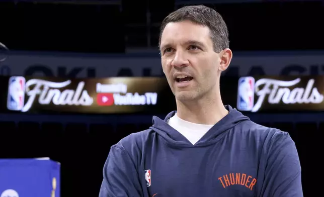 Oklahoma City Thunder coach Mark Daigneault speaks on the court after a news conference, Wednesday, June 4, 2025, ahead of Game 1 of the NBA Finals basketball series against the Indiana Pacers in Oklahoma City. (AP Photo/Nate Billings)