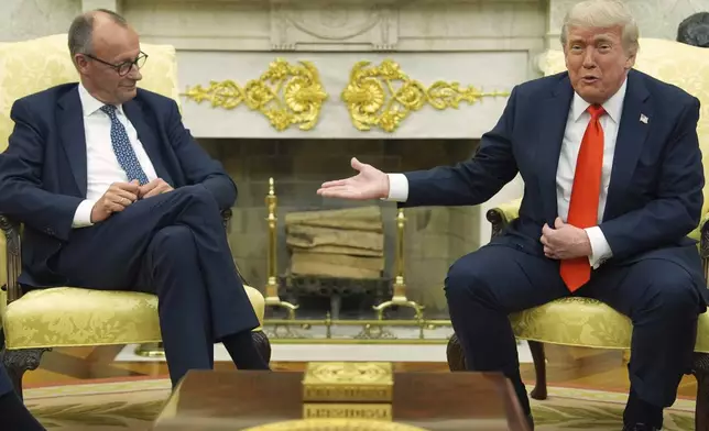 President Donald Trump, right, meets Germany's Chancellor Friedrich Merz in the Oval Office of the White House, Thursday, June 5, 2025, in Washington. (AP Photo/Evan Vucci)