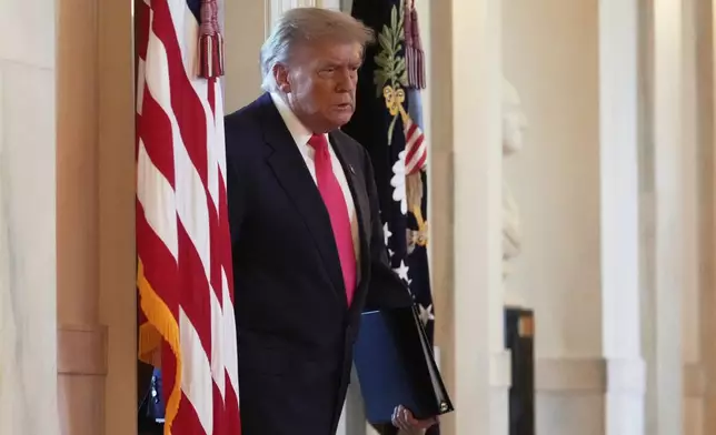 President Donald Trump walks to speak at an event to promote his domestic policy and budget agenda in the East Room of the White House, Thursday, June 26, 2025, in Washington. (AP Photo/Mark Schiefelbein)