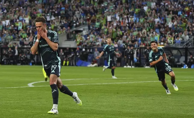 Seattle Sounders forward Danny Musovski reacts after scoring against Austin FC during the second half of an MLS soccer match Saturday, June 28, 2025, in Seattle. (AP Photo/Lindsey Wasson)