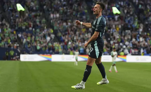 Seattle Sounders forward Danny Musovski reacts after scoring against Austin FC during the second half of an MLS soccer match Saturday, June 28, 2025, in Seattle. (AP Photo/Lindsey Wasson)