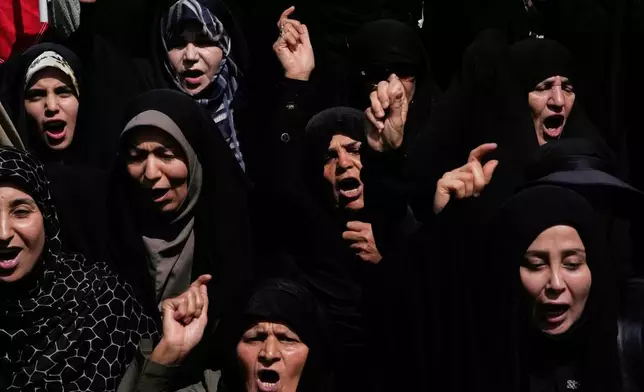 Women chant slogans during a protest to condemn Israeli attacks on multiple cities across Iran, after attending a Friday prayers ceremony in Tehran, Iran, Friday, June 20, 2025. (AP Photo/Vahid Salemi)