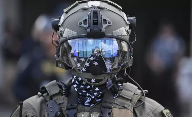 A Los Angeles Sheriff's Response Team member stands during a protest outside the Federal Building on Friday, June 13, 2025, in Los Angeles. (AP Photo/Wally Skalij)