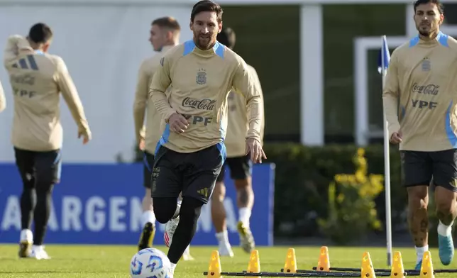Argentina's Lionel Messi, center, trains ahead of a World Cup 2026 qualifier against Chile, at the Argentina Soccer Association in Buenos Aires, Argentina, Tuesday, June 3, 2025. (AP Photo/Gustavo Garello)