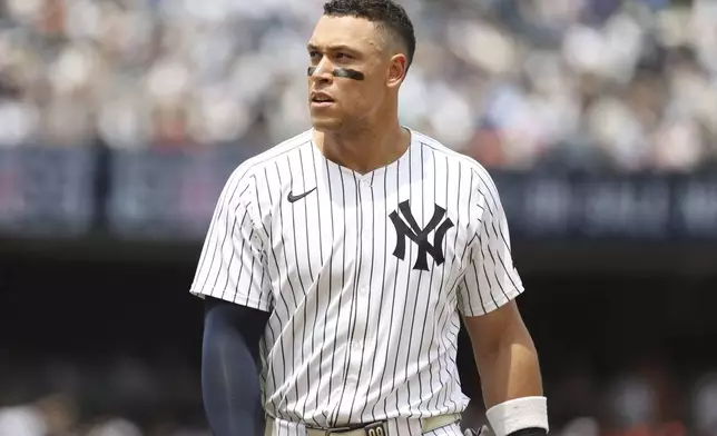 New York Yankees' Aaron Judge walks to the dugout after the seventh inning of a baseball game against the Baltimore Orioles, Sunday, June 22, 2025, in New York. (AP Photo/Pamela Smith)