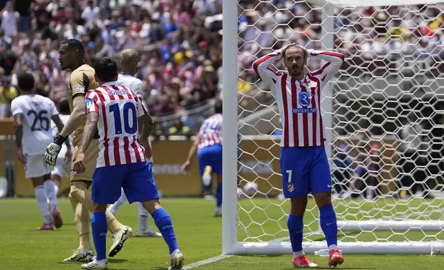 Atletico Madrid's Antoine Griezmann reacts after missing a chance to score during the Club World Cup Group B soccer match between Atletico Madrid and Botafogo in Pasadena, Calif., Monday, June 23, 2025. (AP Photo/Gregory Bull)