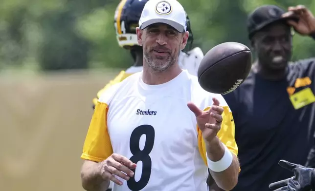 Pittsburgh Steelers quarterback Aaron Rodgers (8) looks on during practice at NFL football minicamp, Tuesday, June 10, 2025, in Pittsburgh. (AP Photo/Gene J. Puskar)