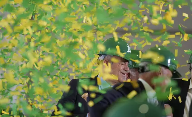 Athletics owner John Fisher participates during a groundbreaking ceremony for the Athletics' baseball stadium Monday, June 23, 2025, in Las Vegas. (AP Photo/John Locher)