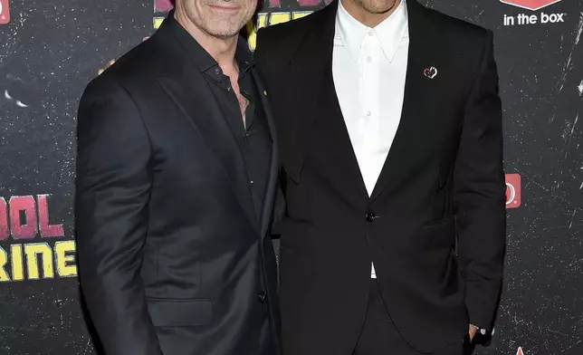 FILE - Hugh Jackman, left, and Ryan Reynolds attend the world premiere of Marvel Studios' "Deadpool &amp; Wolverine" on July 22, 2024, in New York. (Photo by Evan Agostini/Invision/AP, File)