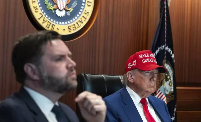 In this image provided by the White House, President Donald Trump, right, and Vice President JD Vance sit in the Situation Room, Saturday, June 21, 2025, at the White House in Washington. (The White House via AP)
