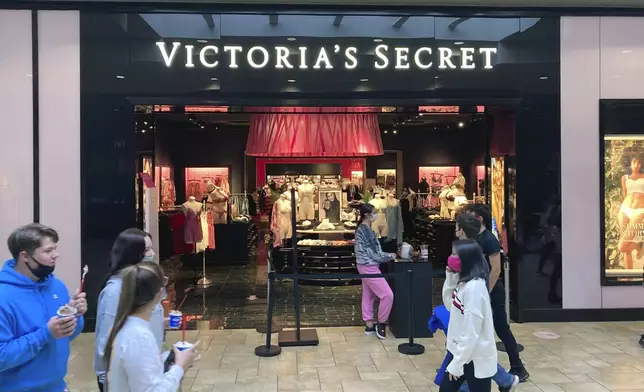 FILE - Shoppers pass a Victoria's Secret store at a shopping mall in Scranton, Pa., May 3, 2021. (AP Photo/Ted Shaffrey, file)