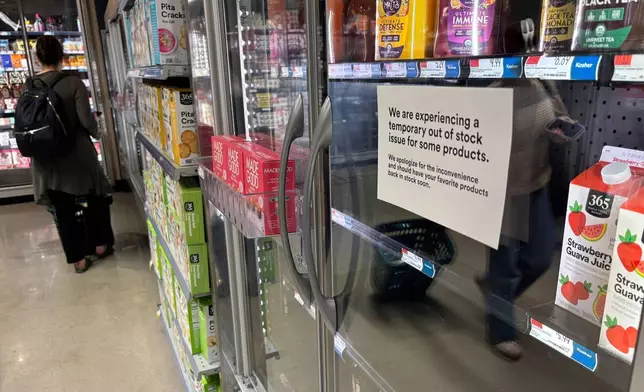 Some shelves at a Whole Foods in New York City sit emptier on June 10, 2025. (AP Photo/Wyatte Grantham-Philips)