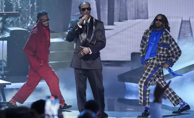 Snoop Dogg, center, performs a medley during the BET Awards on Monday, June 9, 2025, at the Peacock Theater in Los Angeles. (AP Photo/Chris Pizzello)