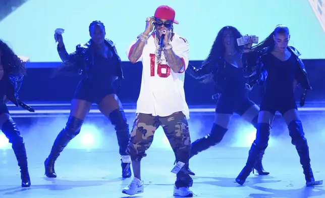 Jim Jones, center, performs during the BET Awards on Monday, June 9, 2025, at the Peacock Theater in Los Angeles. (AP Photo/Chris Pizzello)