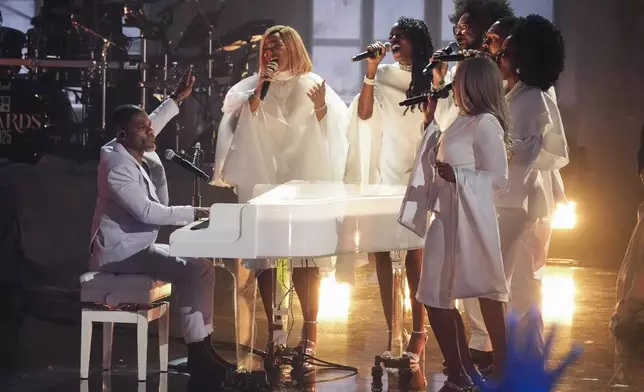 Kirk Franklin, far left, performs during the BET Awards on Monday, June 9, 2025, at the Peacock Theater in Los Angeles. (AP Photo/Chris Pizzello)