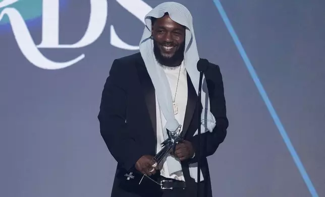 Kendrick Lamar accepts the award for album of the year for "GNX" during the BET Awards on Monday, June 9, 2025, at the Peacock Theater in Los Angeles. (AP Photo/Chris Pizzello)