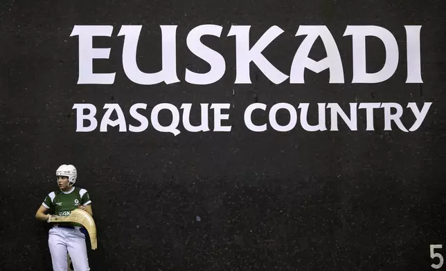 Elaia Gogenola, a member of the Euskadi national team, competes with her teammate Maia Goikoetxea during the Nations League match between the Spanish national team and the Euskadi national team at the Jai Alai fronton in Guernica-Luno, northern Spain, Friday, June 6, 2025. (AP Photo/Miguel Oses)