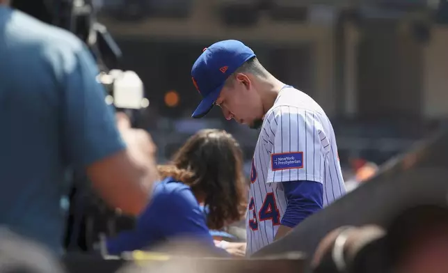 New York Mets pitcher Kodai Senga heads to the clubhouse after he was taken out of following and injury in the sixth inning of a baseball game against the Washington Nationals Thursday, June 12, 2025, in New York. (AP Photo/Pamela Smith)