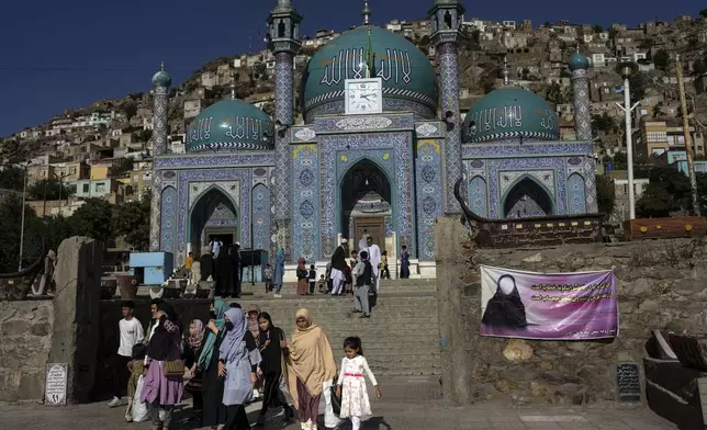 FILE.- Women visit the Sakhi Shah-e Mardan Shrine in Kabul, Afghanistan, Wednesday, June 7, 2023. (AP Photo/Rodrigo Abd,File)
