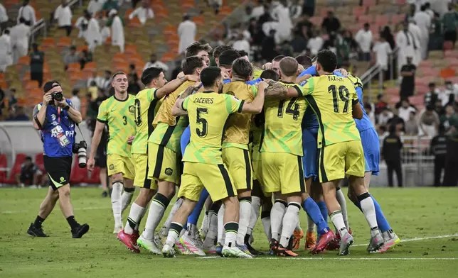 Australia players celebrate after winning a World Cup 2026 Group C qualifying soccer match against Saudi Arabia at King Abdullah Stadium in Jeddah, Saudi Arabia, Tuesday, June 10, 2025. (AP Photo)