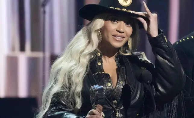 FILE - Beyonce, left, accepts the Innovator Award during the iHeartRadio Music Awards, April 1, 2024, at the Dolby Theatre in Los Angeles. (AP Photo/Chris Pizzello, File)