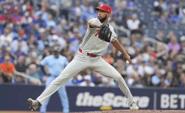 Philadelphia Phillies pitcher Cristopher Sánchez (61) works against the Toronto Blue Jays during the first inning of a baseball game in Toronto, Tuesday June 3, 2025. (Chris Young/The Canadian Press via AP)