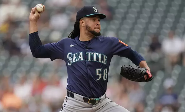 Seattle Mariners starting pitcher Luis Castillo (58) delivers during the first inning of a baseball game against the Minnesota Twins, Tuesday, June 24, 2025, in Minneapolis. (AP Photo/Abbie Parr)