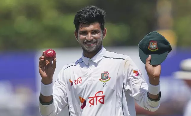 Bangladesh's Nayeem Hasan acknowledges after taking five Sri Lankan wickets during day four of the first cricket test match between Sri Lanka and Bangladesh in Galle, Sri Lanka, Friday, June 20, 2025. (AP Photo/Eranga Jayawardena)