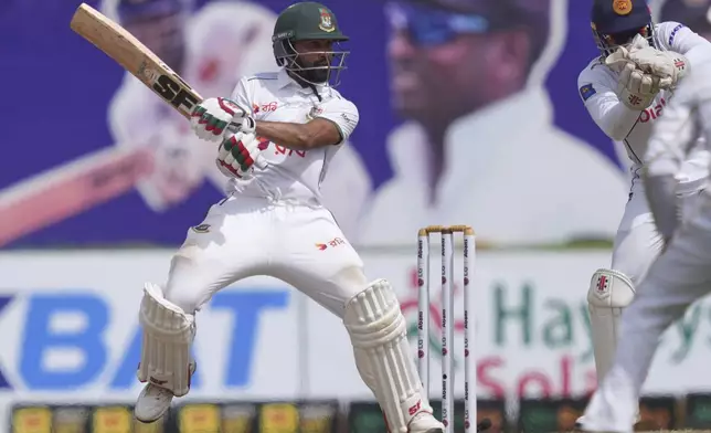 Bangladesh's Shadman Islam plays a shot during day four of the first cricket test match between Sri Lanka and Bangladesh in Galle, Sri Lanka, Friday, June 20, 2025. (AP Photo/Eranga Jayawardena)