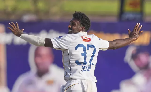 Sri Lanka's Milan Rathnayake celebrates the wicket of Bangladesh's Shadman Islam during day four of the first cricket test match between Sri Lanka and Bangladesh in Galle, Sri Lanka, Friday, June 20, 2025. (AP Photo/Eranga Jayawardena)